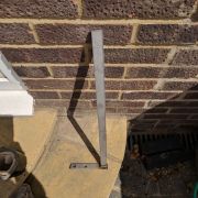 Sliding anchor for wall ties